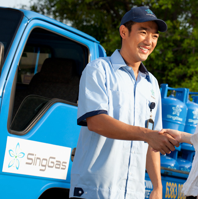 SingGas Employee delivering LPG gas